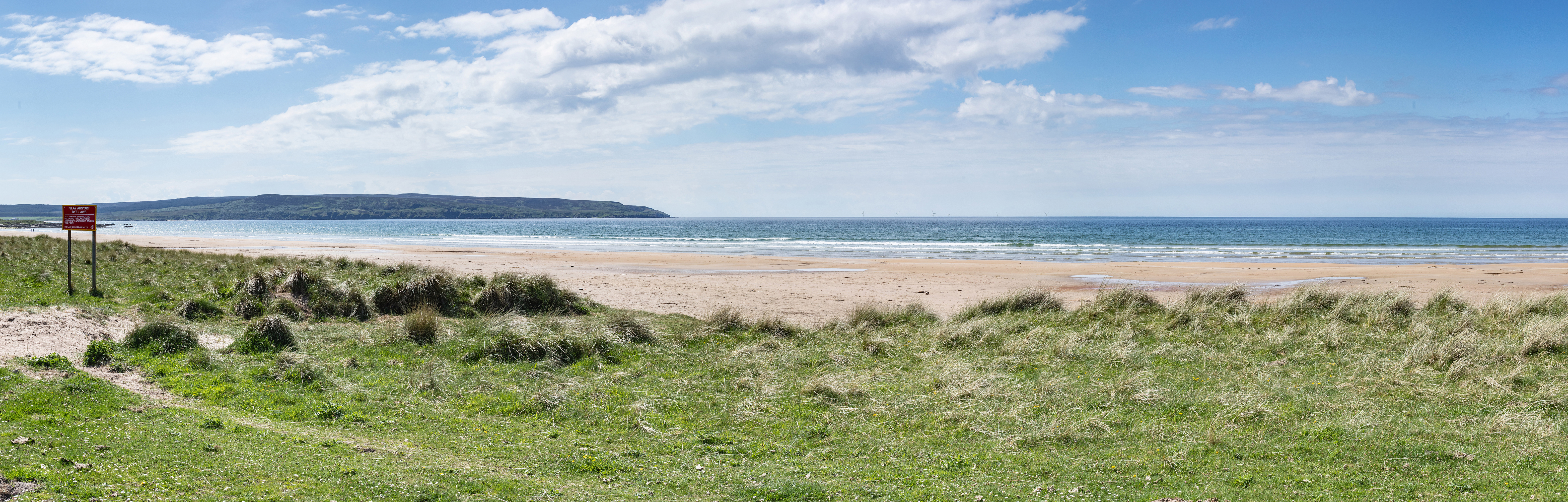 View of Malin Sea Offshore Windfarm from Strand Beach